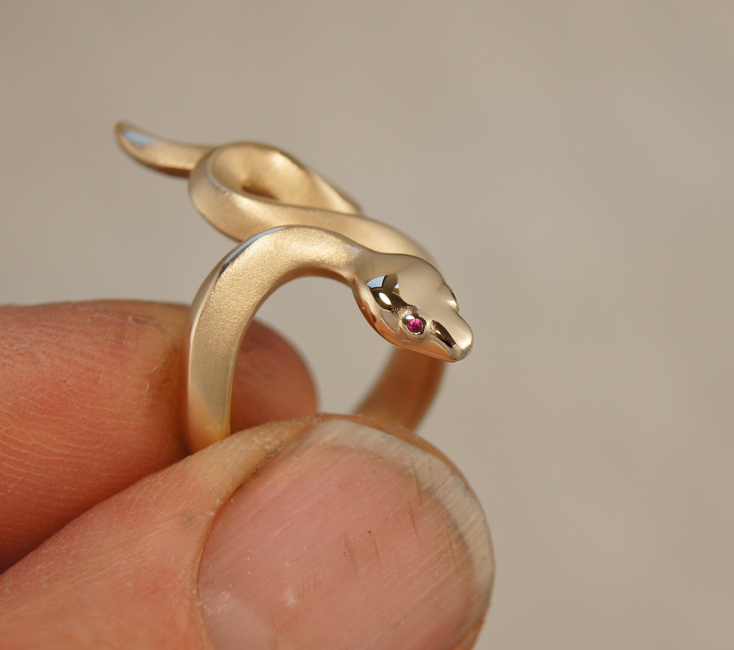 boa snake ring, bronze, ruby or blue sapphire eyes