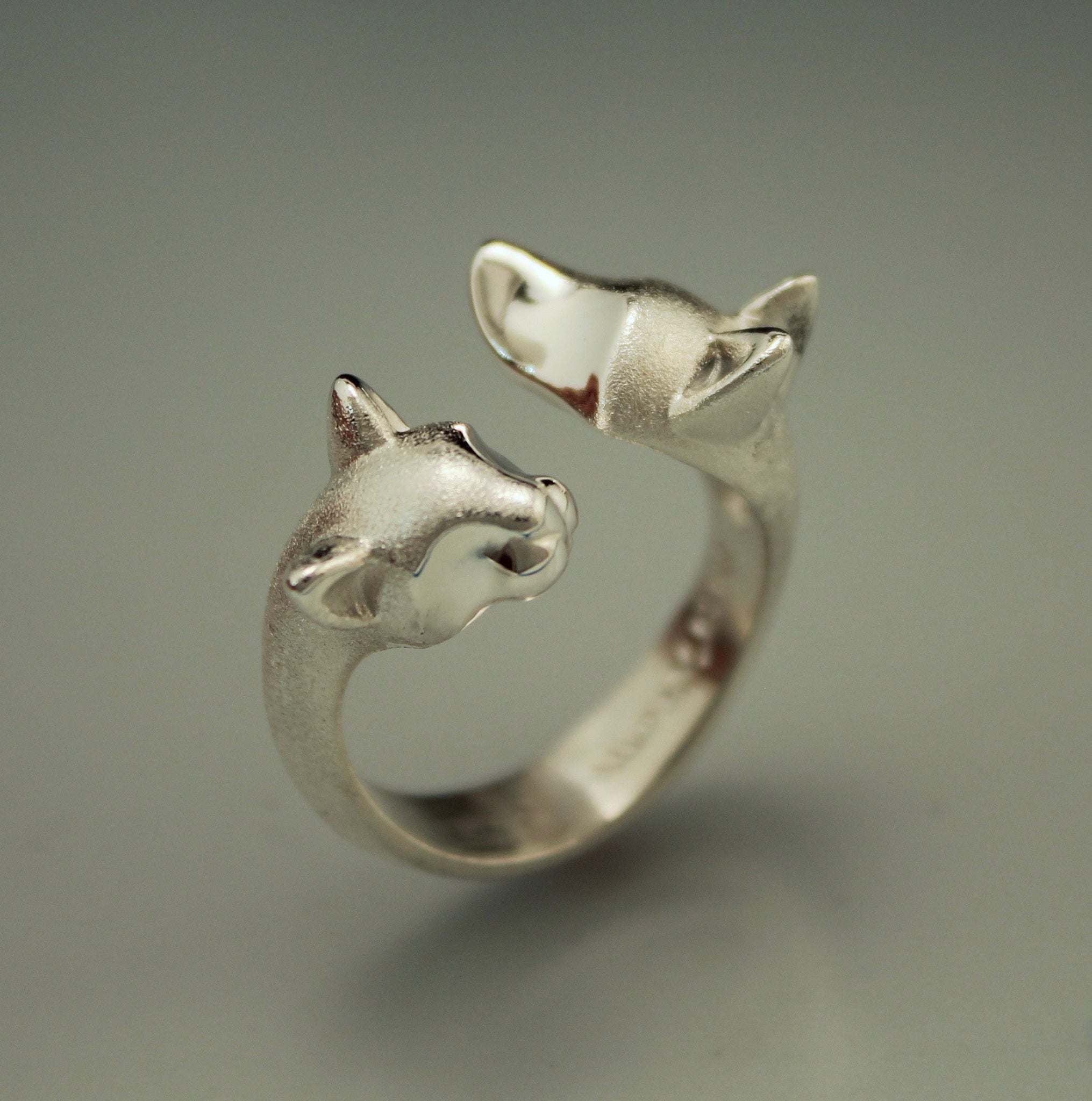 cat and dog ring. silver