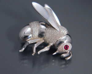 silver bee pin / pendant  with blue sapphire eye