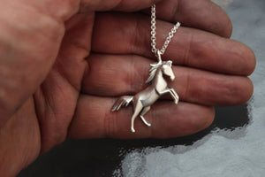 horse pendant .  silver