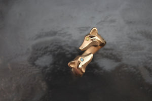double fox ring.  14 k gold , diamond eyes