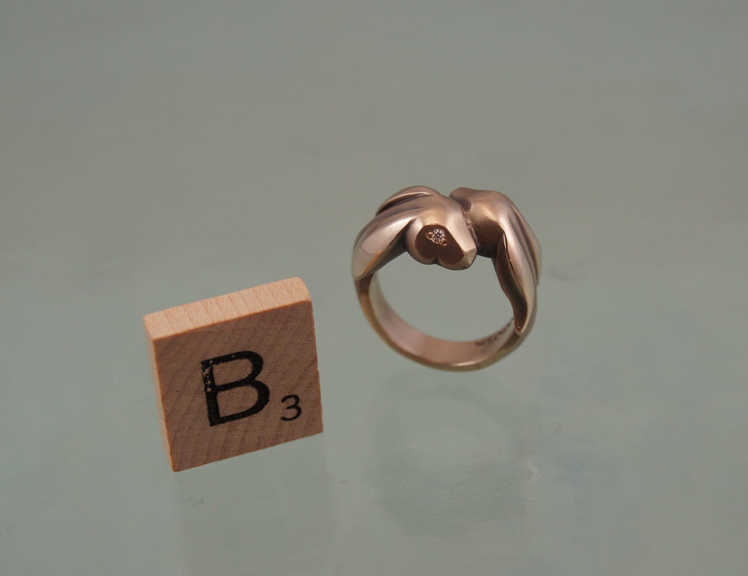 BUNNY  love ring . bronze with diamond eyes