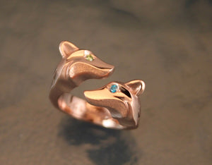 double fox ring.  14 k gold , diamond eyes