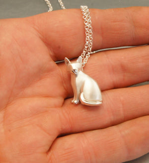 sitting CAT, silver