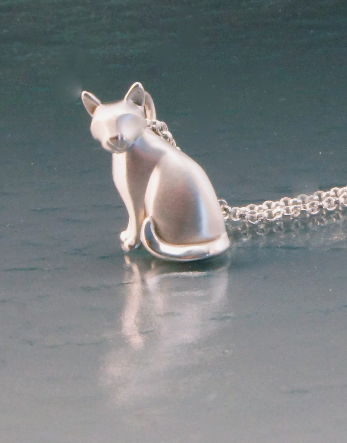sitting CAT, silver