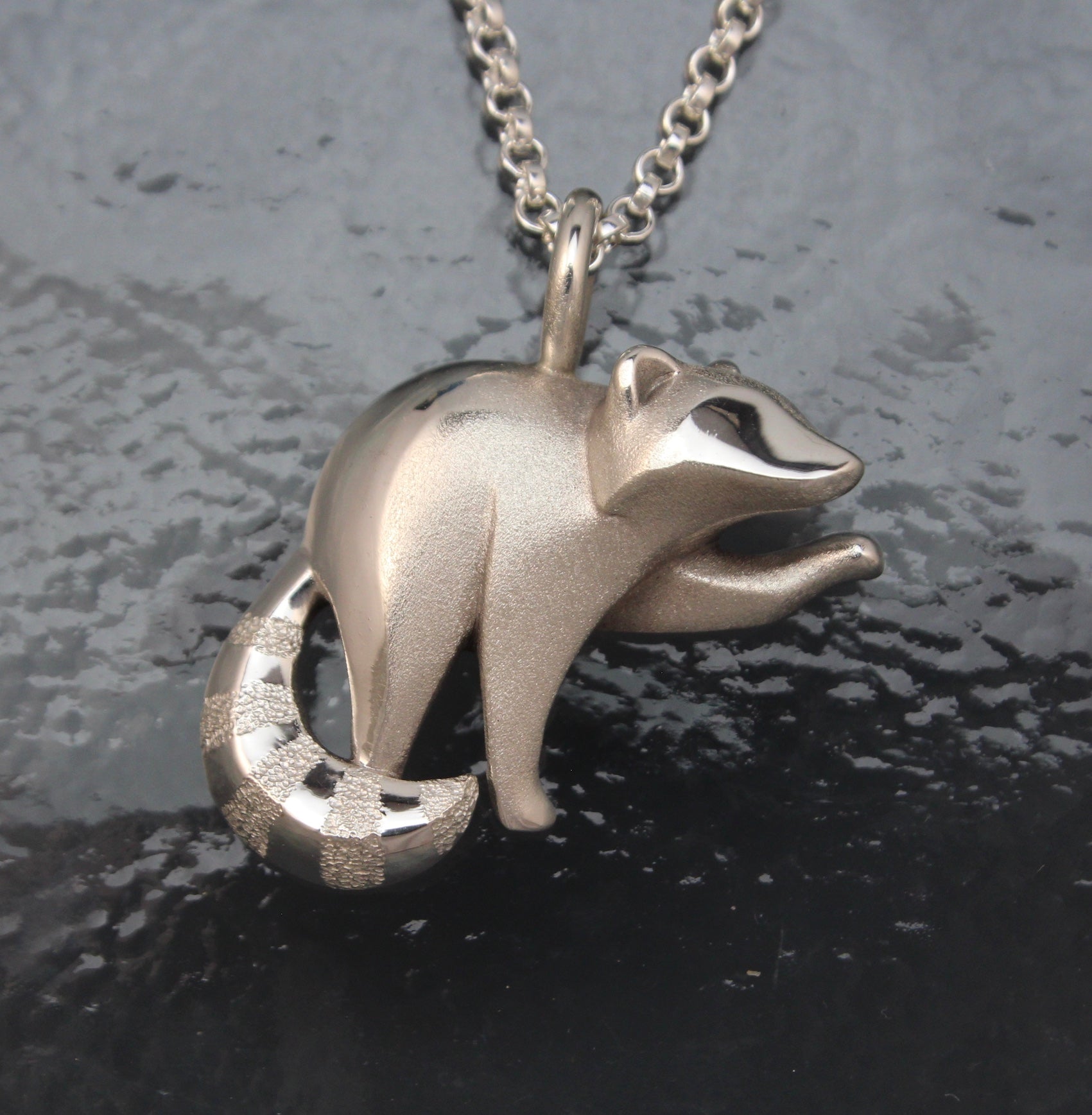 silver raccoon pendant