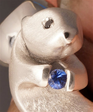 silver sea otter ring, with gemstone eyes