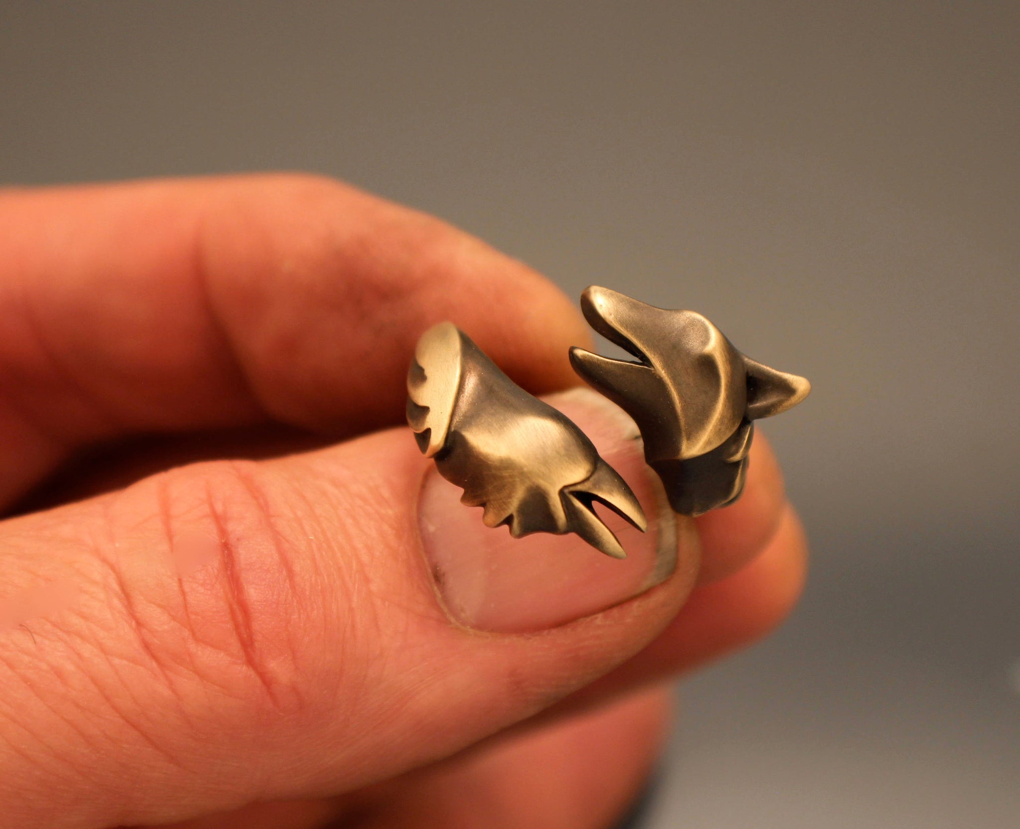 raven and wolf ring with classic bronze finish