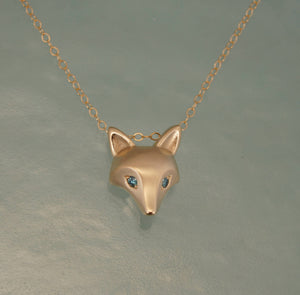 bronze fox pendant with diamond eyes