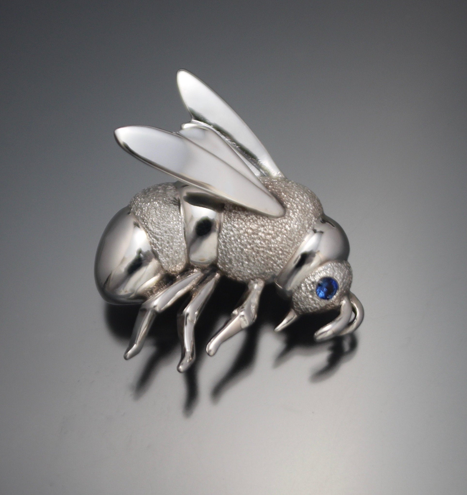 silver bee pin/pendant with gemstone eyes