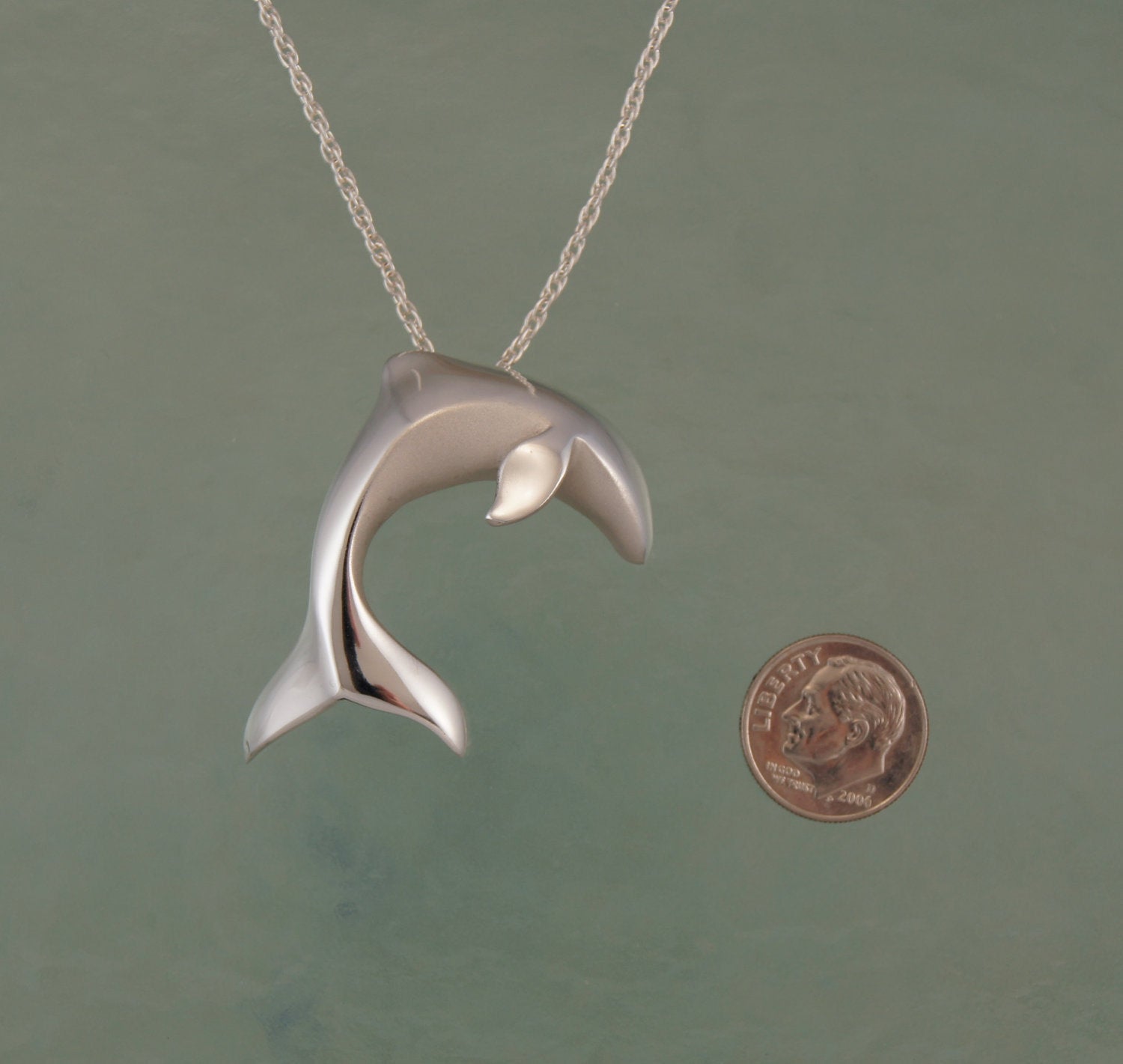 small silver dolphin pendant
