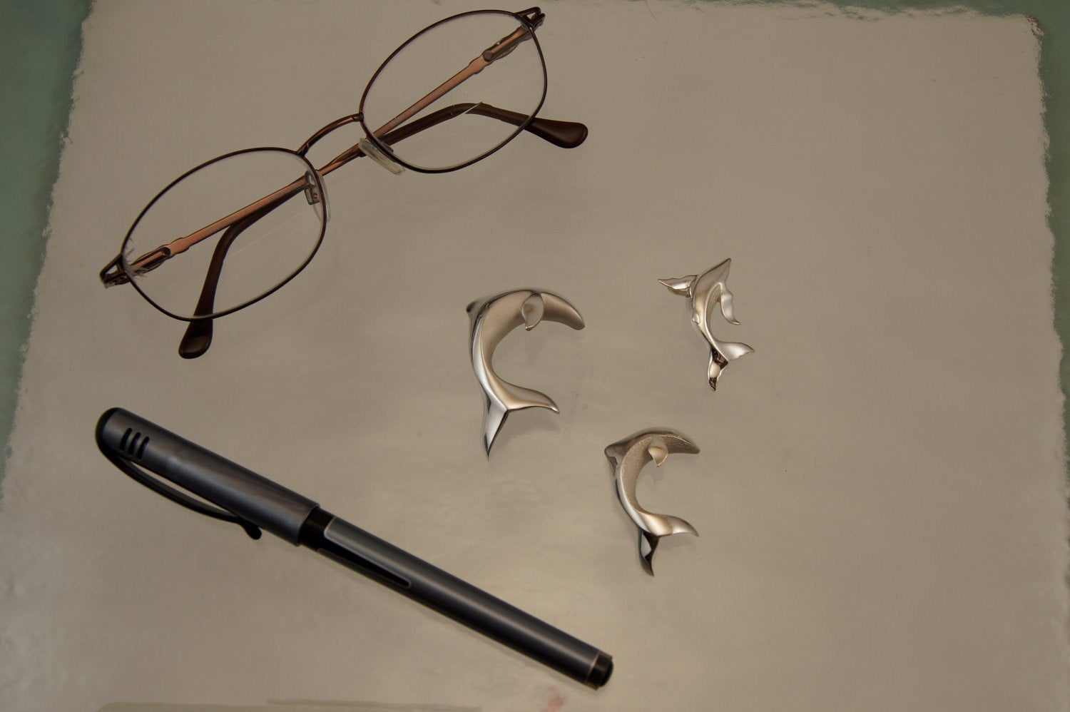 small silver dolphin pendant