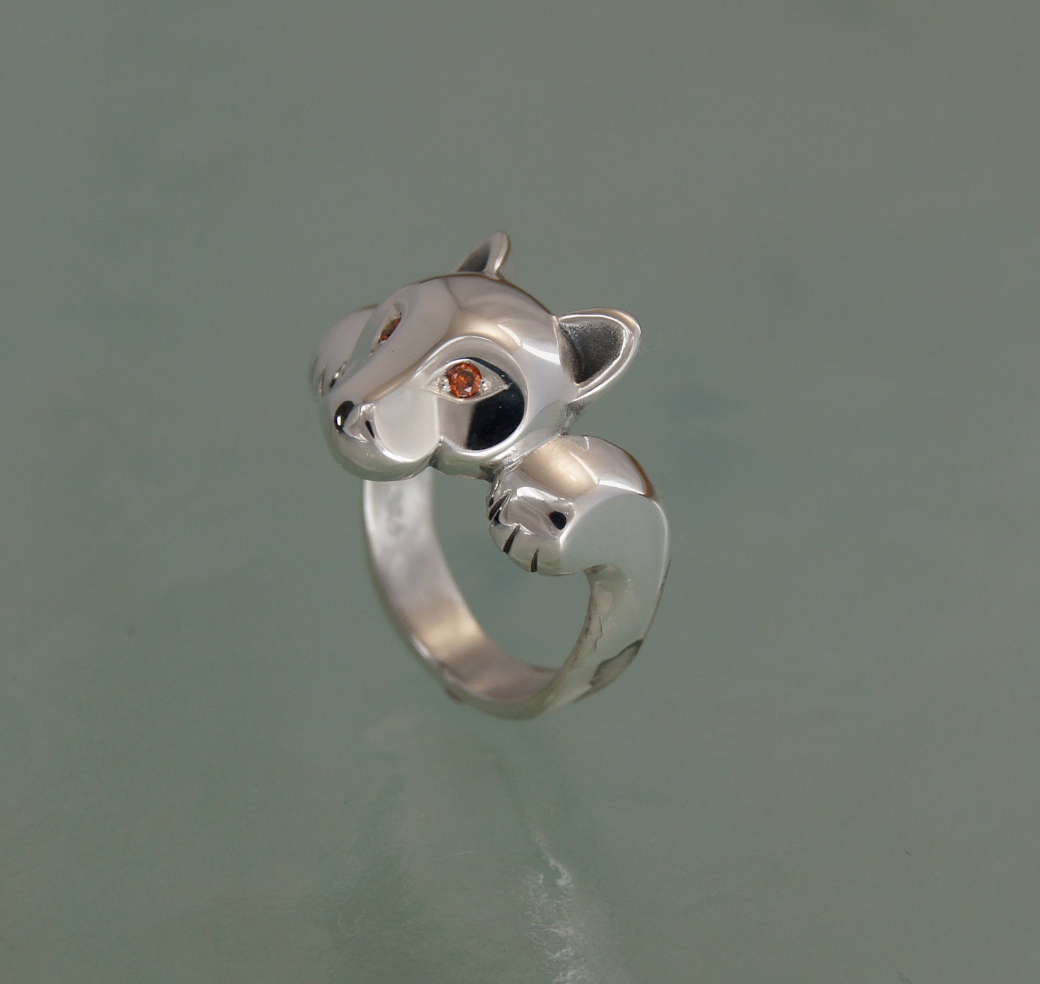 leaping puma silver ring with gemstone eyes