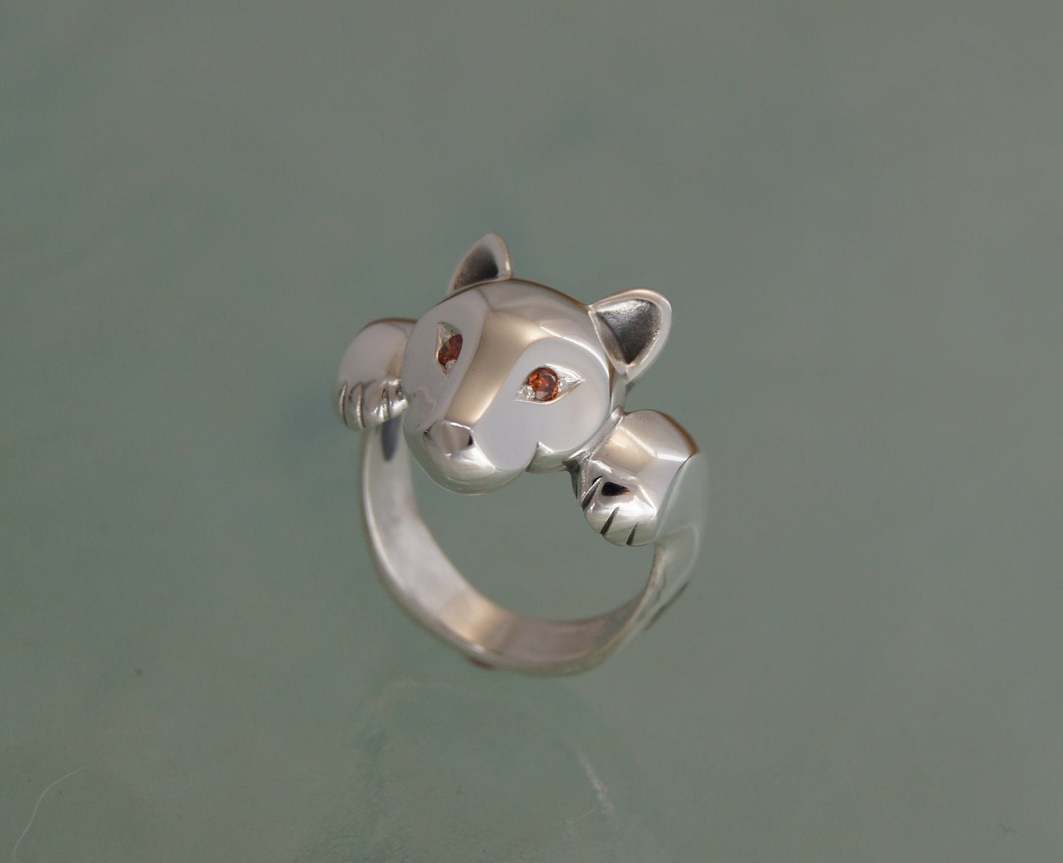 leaping puma silver ring with diamond eyes