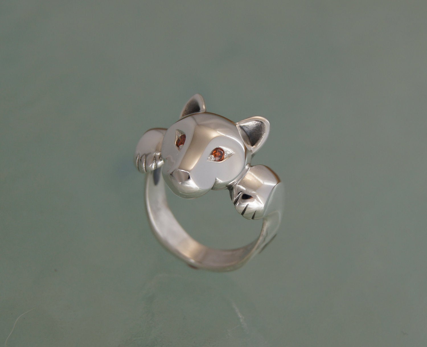 leaping puma silver ring with gemstone eyes