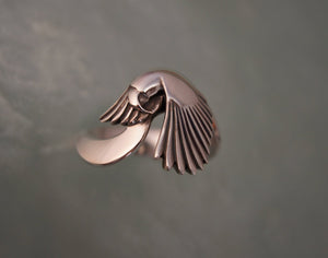 silver parrot ring, 10% of purchase goes to Nebraska Parrot Rescue