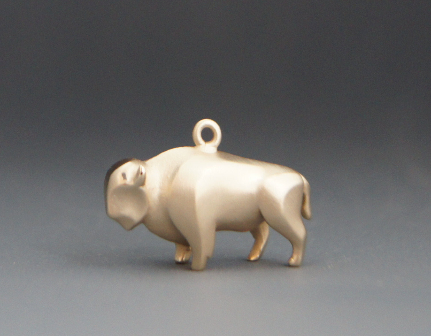 bronze buffalo charm or pendant