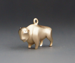 bronze buffalo charm or pendant