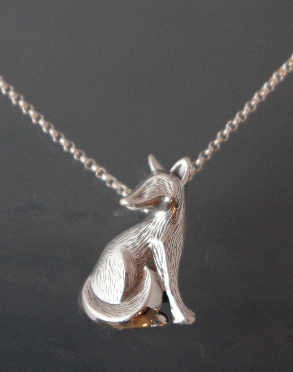 furred silver fox pendant