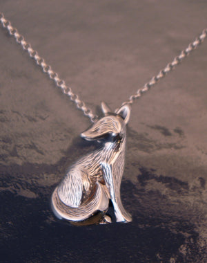 furred silver fox pendant