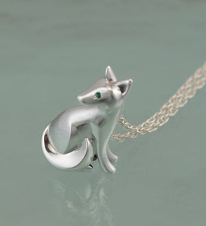 silver sitting kit fox pendant, with gemstone eyes