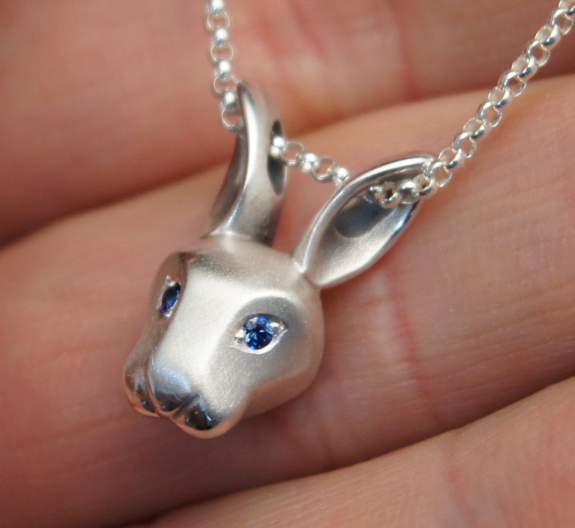silver bunny pendant, with gemstone eyes