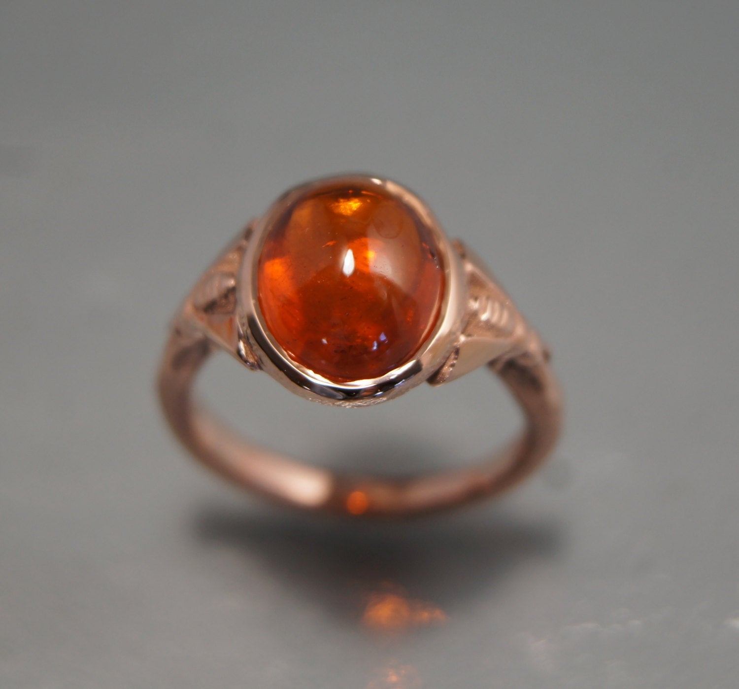 14k rose gold honey bee ring with spessartite